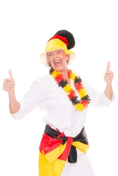 Senior woman as a German football fan in front of white background
