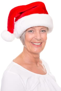 Senior woman with a Santa hat against a white background