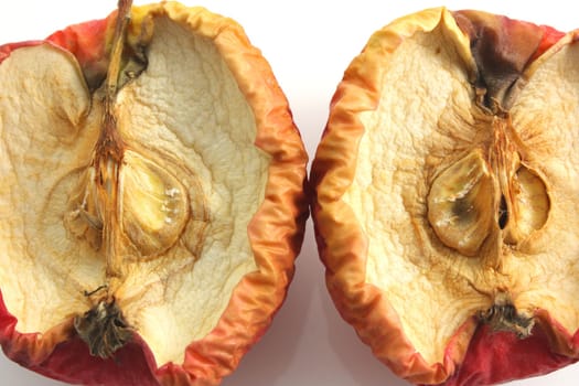 Rotten apple halves