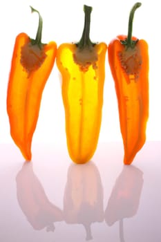 Peppers in half with light through them