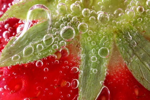 Strawberries in water close up
