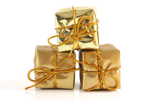 Three gold box parcels