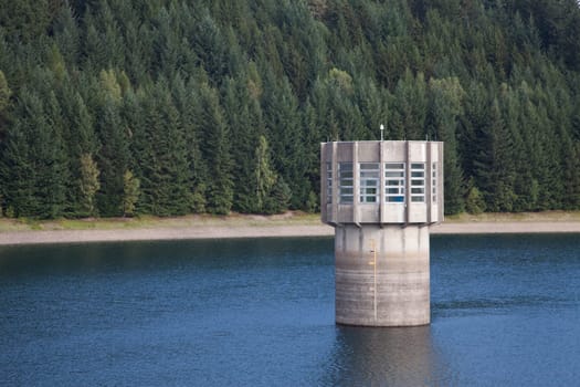 Extraction tower dam toll house