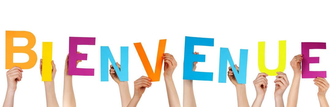 hands holding the french word BIENVENUE which means welcome, isolated