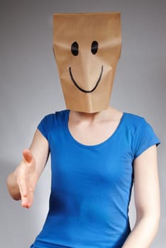 a happy person doing a handshake gesture, gray background