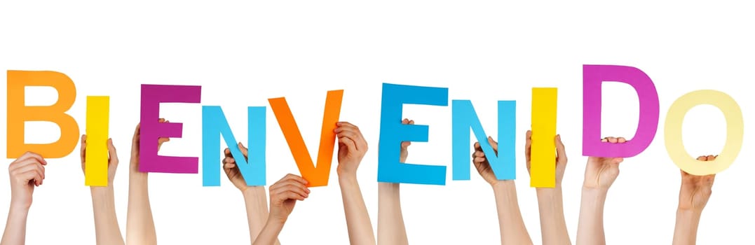 hands holding the spanish word BIENVENIDO which means welcome, isolated