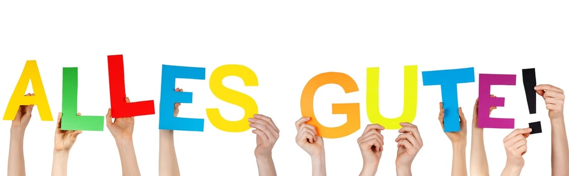 hands holding the german word ALLES GUTE! which means congratulations/best wishes, isolated
