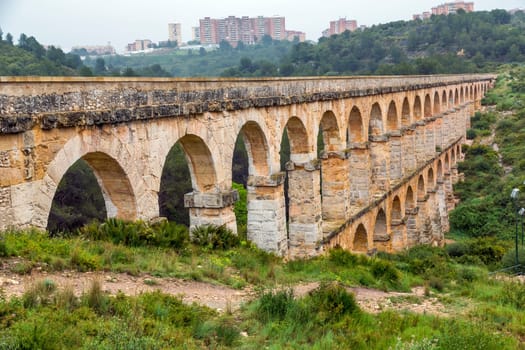 view of the roman aqueduct Pont del Diable, Tarragona, Spain