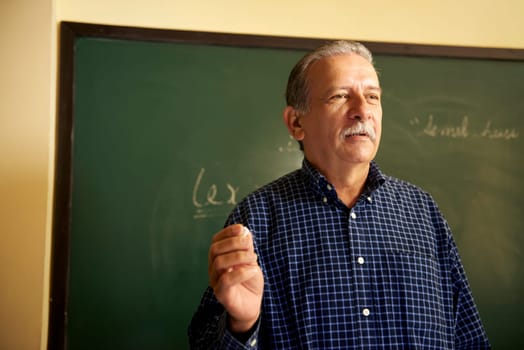 People and education, professor talking to students during lesson in college, Law School, University of Havana, Cuba