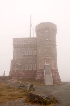 Cabot Tower in the fog, Signal Hill, Saint John's, Newfoundland and Labrador, Canada.