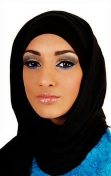 A pretty and young teen girl with a black headscarf and nice makeup looking into the camera for white background.