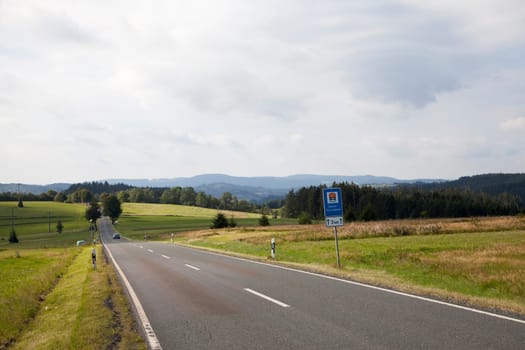 Country road with car in the water protection area near Ködelberg