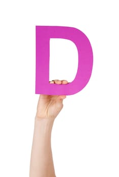 the letter d, hold by a hand, isolated