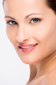 Beauty portrait of a young blonde woman, isolated on white background