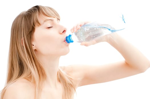 beautiful sexy young woman isolated on white background drinking water form plastic bottle