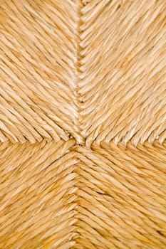 Texture of a traditional handcrafted technic of chair construction made with rattan palm plant by the Portuguese.