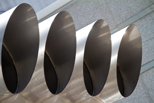 Close view of some big airconditioning exhaustion vents.