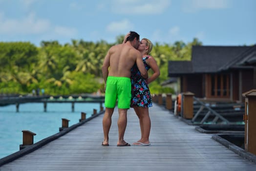 happy young  couple at summer vacation have fun and relax at beautiful sunny  day on beach