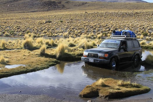 Car stuck in water, Eduardo Alveroa, Uyuni Bolivia
