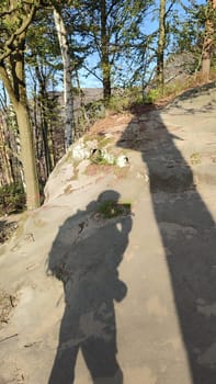 Shadow person hiking shadow earth tourism tourist trees nature summer travel . High quality photo