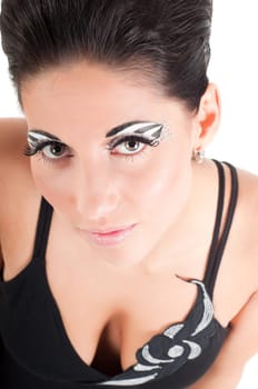 Woman with face art watching on you