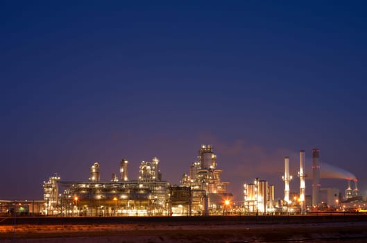 Refinery at night in the Port of Rotterdam, Europoort, Holland
