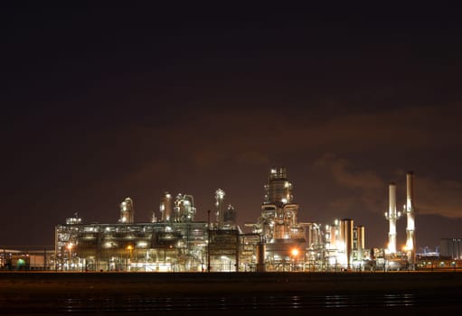 Refinery at night in the Port of Rotterdam, Europoort, Holland