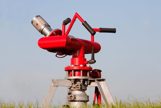 Red fire hydrant in an industrial area