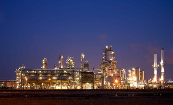 Refinery at night in the Port of Rotterdam, Europoort, Holland