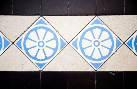 Antique tiles in the interior of the Saigon Central Post Office, Vietnam