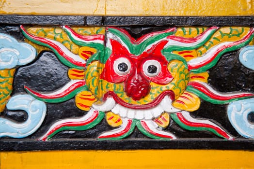 Temple detail on the exterior of a Cantonese Assembly hall in Hoi An, Vietnam