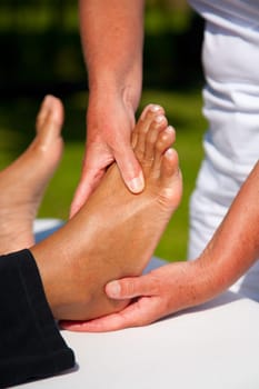Polarity massage  a technique of gently rocking, holding and massaging to stimulate relaxation, restore energy flow and encourage revitalization