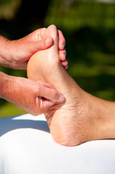 Polarity massage  a technique of gently rocking, holding and massaging to stimulate relaxation, restore energy flow and encourage revitalization