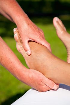 Polarity massage  a technique of gently rocking, holding and massaging to stimulate relaxation, restore energy flow and encourage revitalization