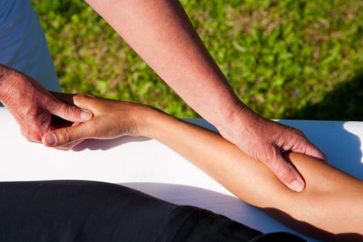 Polarity massage  a technique of gently rocking, holding and massaging to stimulate relaxation, restore energy flow and encourage revitalization