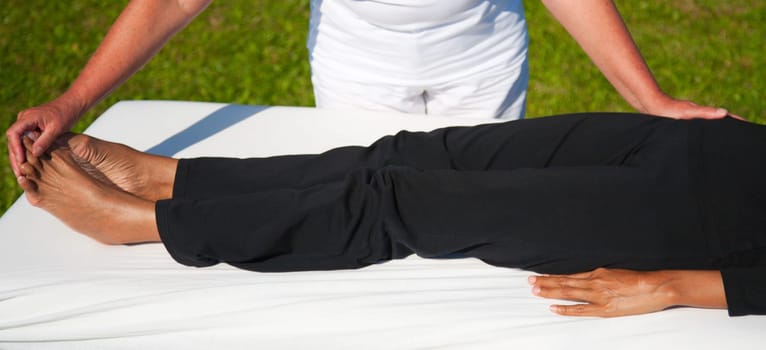 Polarity massage  a technique of gently rocking, holding and massaging to stimulate relaxation, restore energy flow and encourage revitalization