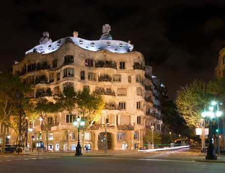 Casa Mila by night, designed by Antoni Gaudi in Barcelona, Spain