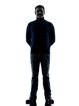 one caucasian man full length in silhouette studio isolated on white background