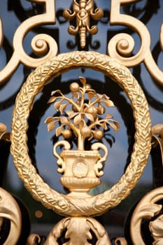 Detail of a golden ornate door of the Loo Palace in the Netherlands