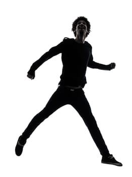 one african handsome young man jumping   in silhouette studio isolated on white background