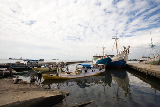 Makassar schooners (pinisi) in Paotere harbor, the old port of Makassar,  Indonesia