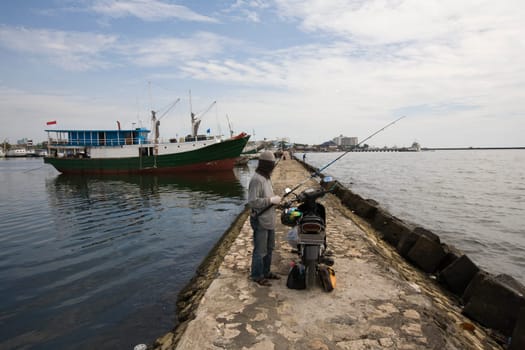 Fisherman in Paotere harbor, the old port of Makassar