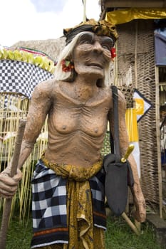 Balinese statue of and old man