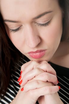 young woman prays