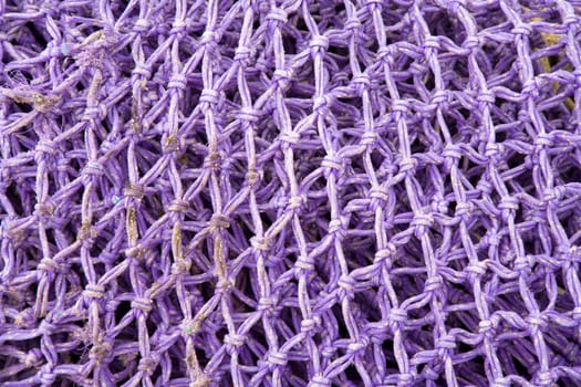 Pattern of fishnets drying in the sun in Ijmuiden, the Netherlands