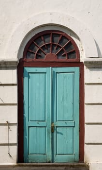 Traditional Dutch colonial door in an old VOC warehouse in Jakarta, Indonesia