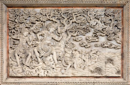 Traditional stone carving in a temple in Bali