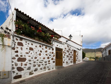 Old street in Santa Lucia de Tirajana with original stone houses