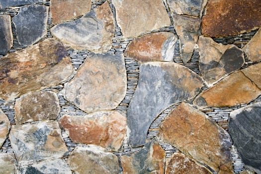 Close up image of a natural stone wall