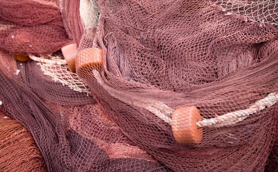 Pattern of fishnets drying in the sun in Puerto de Mogan, Gran Canaria